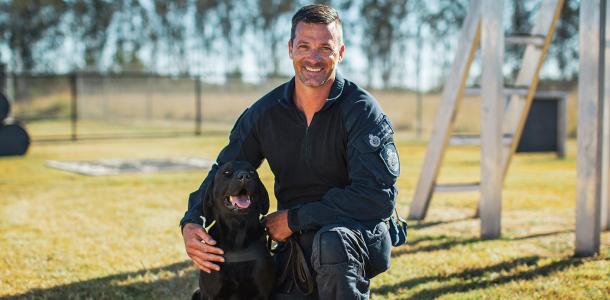 Senior Constable Scott Lewis and Firearms and Explosives Detector Dog Naya make a great team